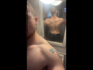FTM flexes back muscles and does pull-ups Video