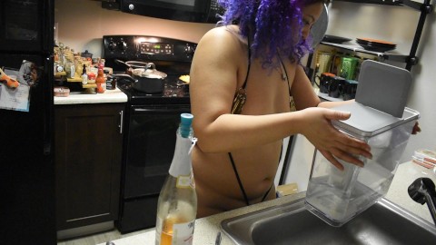 Cleaning fridge in micro bikini housewife