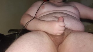 A big dude with big tits, ready to cum your face