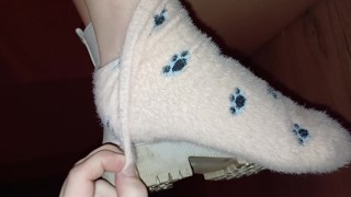 Taking off her boots with wool socks and worshipping her dirty unpedicured feet