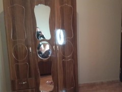 Electro BDSM. Dominatrix Nika plays with slave's balls in chastity belt. Nipple games. CBT