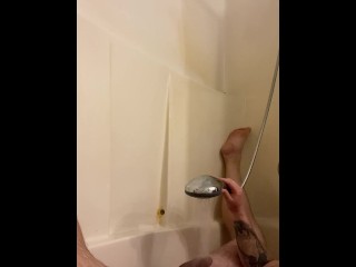 I cum with my shower head and it goes all over me. Video