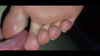 Worshipping her stinky, salty feet and covering them with cum