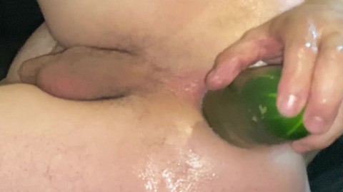 Anal stretching, inserting big cucumber alone