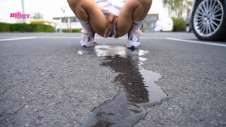 Sexy and horny girl pees in public