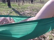Preview 2 of Naked girl masturbates in a hammock