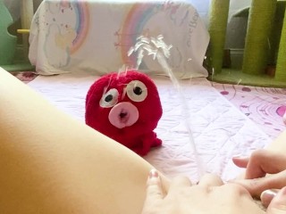 College Babe Pisses on a Plushie Video