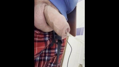 big uncut flaccid cock pisses in the evening watering everything