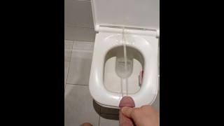 Pissing with hard cock