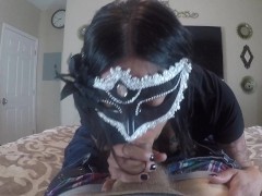 MILF does a little dress-up mask blowjob