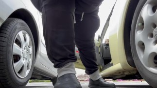 Sexy snow bunny pees on busy road in public