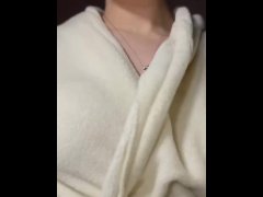 hot girl plays with her breasts in a robe.