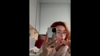 Small teen redhead shows off her blowjob and deepthroat skill
