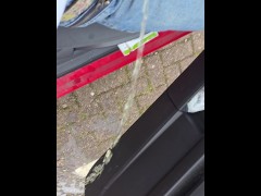 Pissing out of the neighbours car in a public car park at the care home