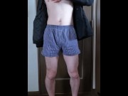 Preview 1 of An exhibitionist masturbates while wearing a coat and underpants.