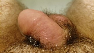 Close up of my small limp penis while taking bath