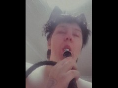 Femboy lubes up butt plug with his mouth