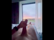 Preview 1 of Wanking in front of the window at large hotel. Hope someone sees me ;) full video to cum soon