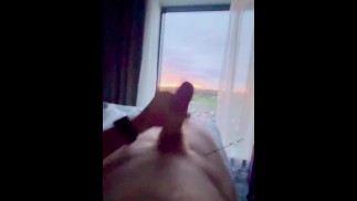 Wanking in front of the window at large hotel. Hope someone sees me ;) full video to cum soon