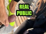 RISKY PUBLIC FOOTJOB WITH NATURAL CUTE GIRL