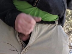 Jacking off in the woods.