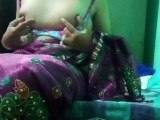 Indian Gay Crossdresser in pink saree pressing and milking his boobs so hard and enjoying the hardco