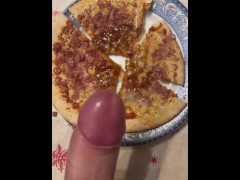 cumming on a pizza