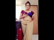 Preview 1 of Desi Indian Step Mom Strip Teasing her Step Son in Kitchen and He Fucked Her