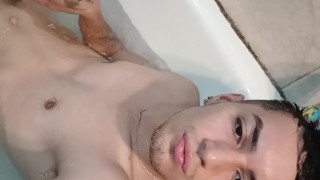 Masturbating and enjoying a hot tub
