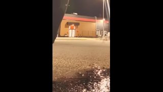 Horny babe desperate to pee. Let loose in a truck stop parking lot.