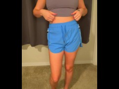 Sexy college girl getting dressed to go for a run