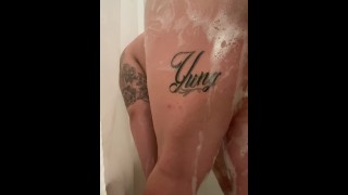 Horny white girl washes big booty in shower
