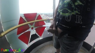I jerk my cock very riskily in a transparent outdoor elevator on the 13th floor.