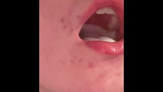 Playing with cum in mouth