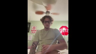 Tattooed guy cums all over himself