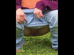 Skinny milf peeing at the park