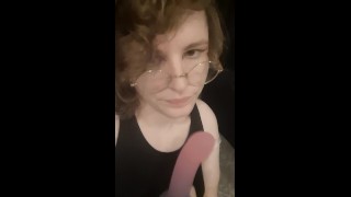 A cute nerd trans femboy, masturbates and plays with a sextoy, while taking a selfie