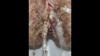 Creamy pink pussy peeing 💦 Closeup pee fetish