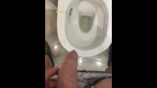 pissing hard at public wc