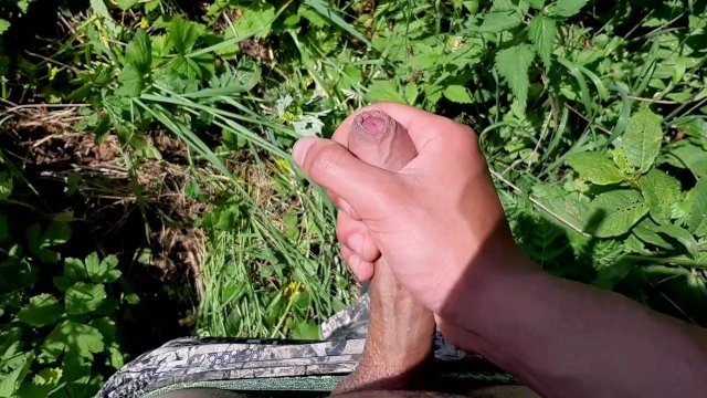 I went out to jerk off in a field by the road.Beautiful cum with a good dick