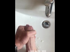 Slo motion masturbation into the sink by big cock hung guy with uncut cock
