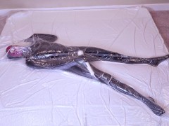 Dollified #1 - A Tiny Vacuum-Sealed Rubber Toy Getting Herself Off With A Magic Wand - Screenshot 6 of 16 - Latex