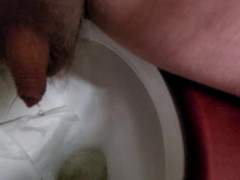 Pissing in a slow motion toilet bowl