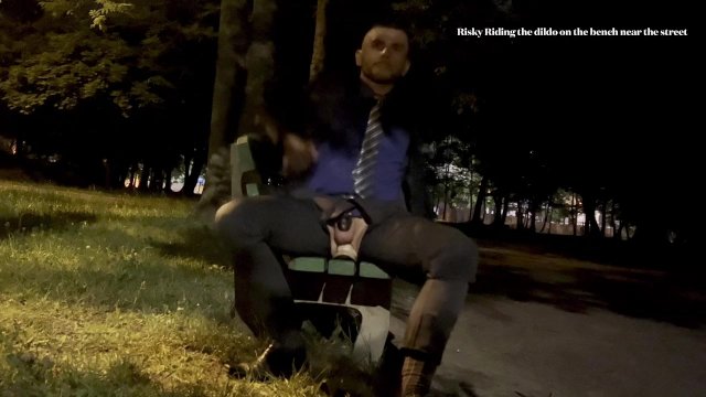 businessman is riding the dildo outdoor in public and he is cumming outside by the road