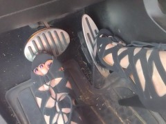Big feet pedal pumping the gas pedal in strappy sexy black heels