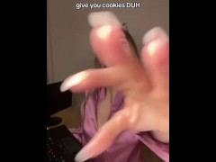 Blonde girl bouncing boobs while giving away cookies.