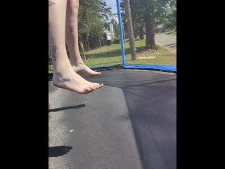 Slow motion jumping on a trampoline in shorts & T-shirt regular woman jumping not a big tit slut