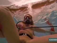 Hot chicks with a guy in the pool