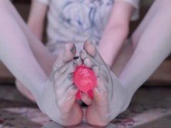 Small feet girl wearing five toe pantyhose and stroking dick