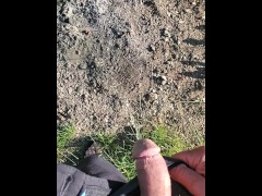 Taking a piss outside.